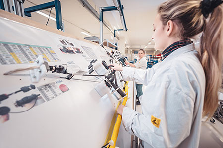 Employee of PSZ electronic at work